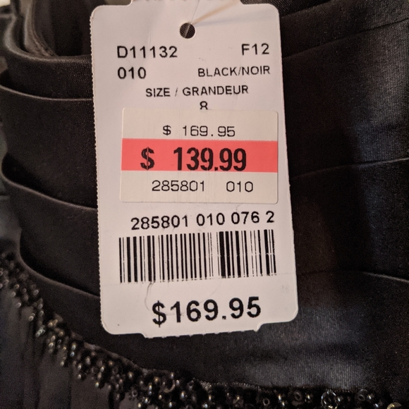 Brand new with tags beautiful feather look dress. - Picture 2 of 3